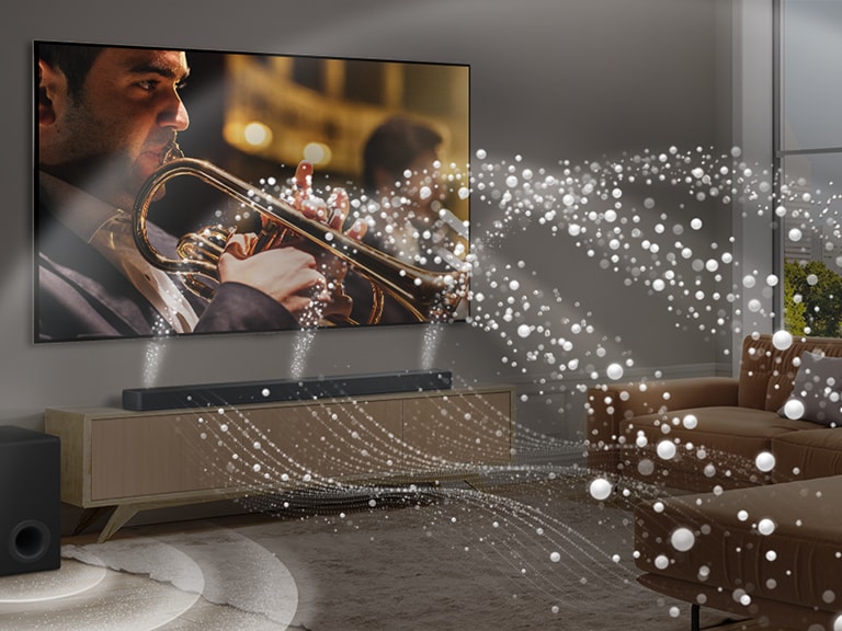 LG TV, LG Soundbar, and a subwoofer are placed in a modern city apartment. LG Soundbar is emitting soundwaves made of white droplets filling the room and a subwoofer is creating a sound effect from the bottom. As a whole, they are creating a dome effect across the room.