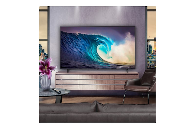 Before and after comparison of how LG 4K Super Upscaling improves image quality. Two panels showing the same image of a colourful bird sitting on a branch in a forest, panel on the right is faded out. The title talks about how 4K Super Upscaling enhances resolution, brightness and clarity.