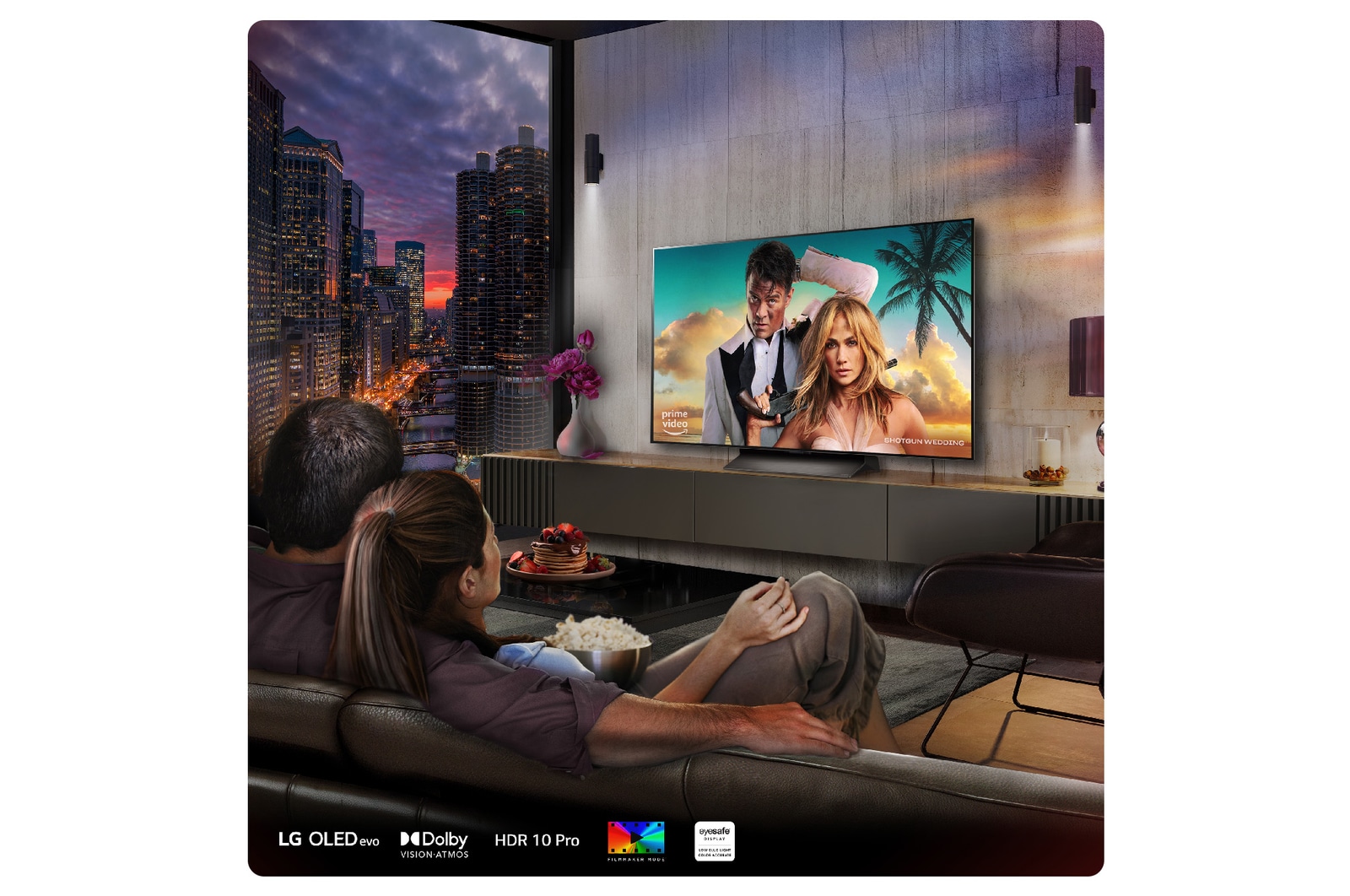 Couple watching movie in LD OLED TV