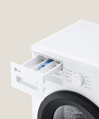 Close-up of the washing machine detergent compartment.