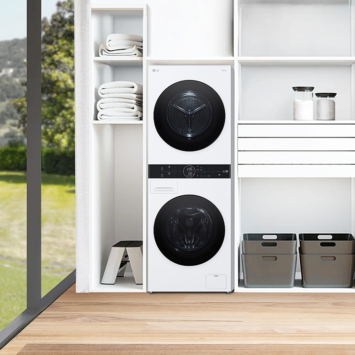 Wash tower installed in white laundry with front yard view