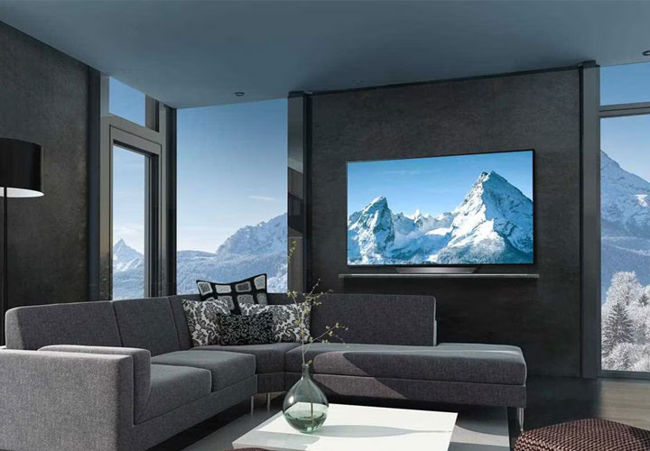 An LG OLED TV in a modern living room.