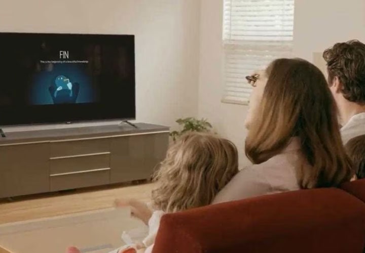 An image of family watching LG smart TV in living room