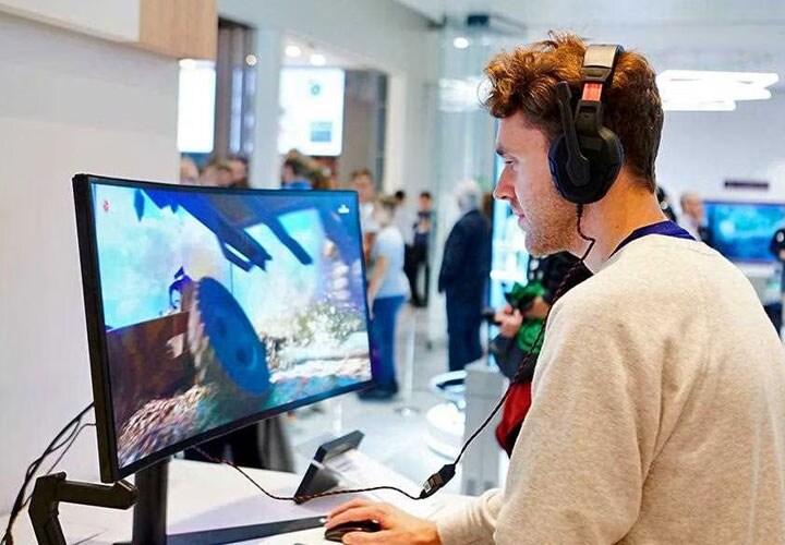 IFA 2018: A man playing video games on the 32GK850G LG Monitor in the gaming section of the exhibition