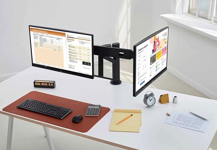 Adjustable dual monitors save space with a C-clamp stand