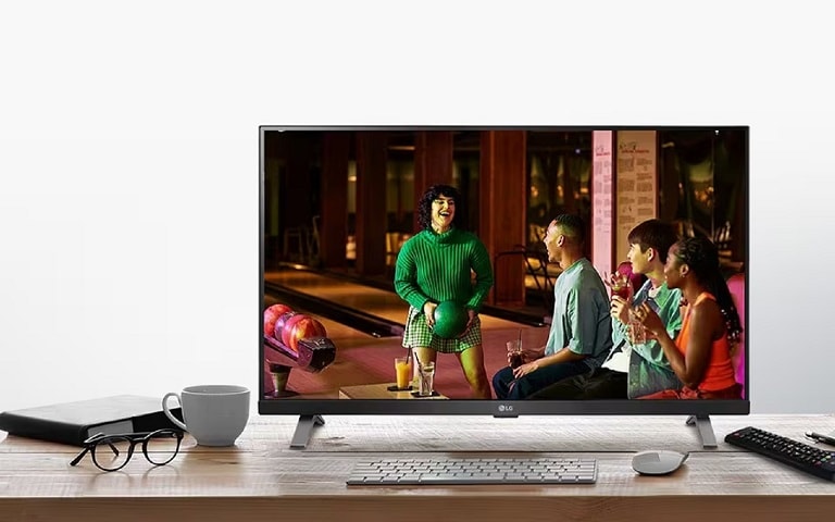 LG affordable PC monitor displaying a social gathering scene, emphasising vibrant colours and clear visuals ideal for home entertainment.