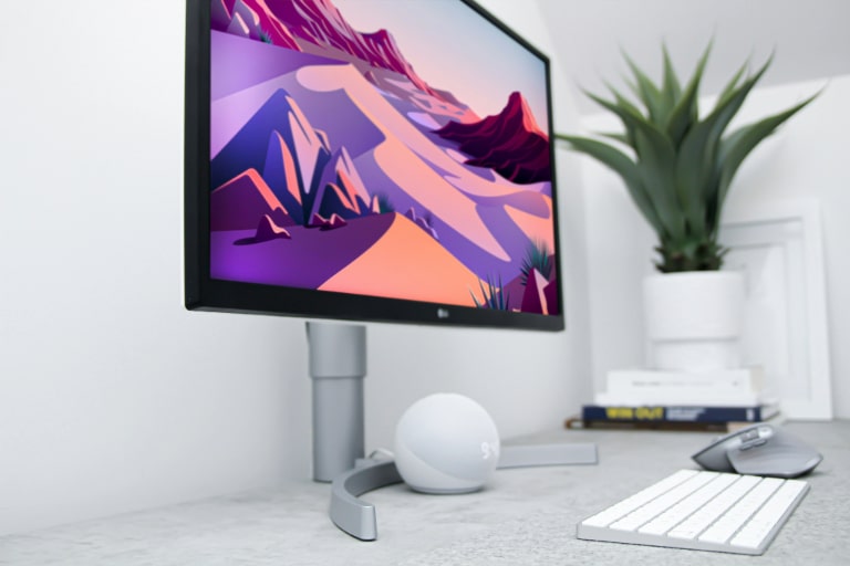 Essential tools for optimising remote work in a home office setup, including advanced technology and ergonomic equipment to enhance productivity and comfort.