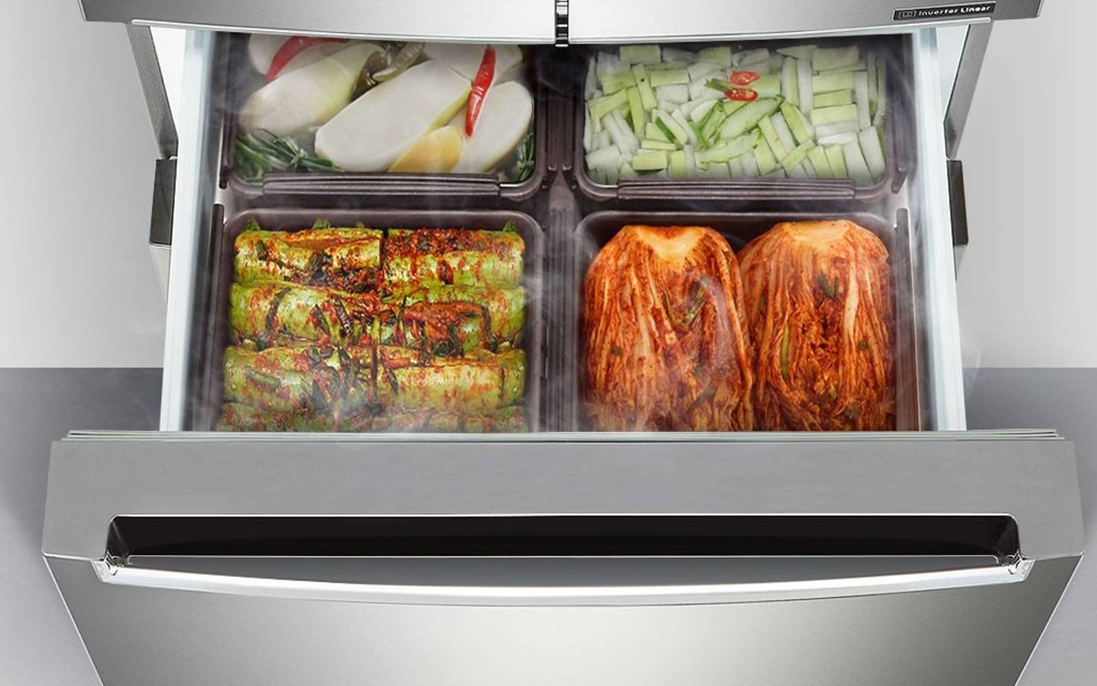 Open drawer of an LG Kimchi fridge, displaying neatly organised containers holding various types of kimchi. The stainless steel fridge is designed for optimal storage and preservation of fermented foods, keeping them fresh and well-organised.