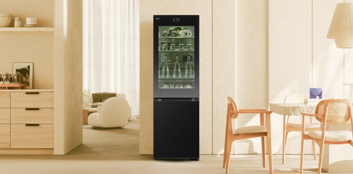 In a cozy beige-toned dining space, the LG InstaView refrigerator is placed with its mirror glass feature on.