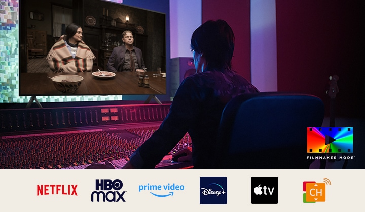 A director in front of a control panel editing the movie "Killers of the Flower Moon" on an LG QNED TV. In the bottom left, the Dolby Vision logo and FILMMAKER MODE logo. Below the image are logos for Netflix, HBOmax, Prime Video, Disney Plus, Apple TV and LG Channels. 	
