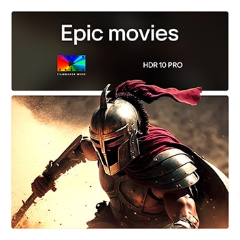 LG TV screen with an AI Magic Remote on the foreground. The AI button is highlighted and a speech bubble shows text, suggest a movie I like. On the screen we see the user icon E, indicating how AI Voice ID was able to identify which user it was and give personalized recommendations just based on their voice.