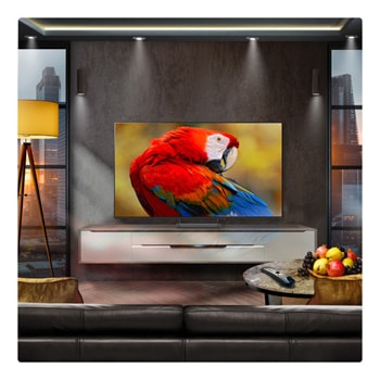 A family sits on a couch facing a LG QNED TV sitting above a TV stand with a little girl pointing to a screen depicting two dolphins. The title talks about how you can enjoy high resolution on a massive screen.