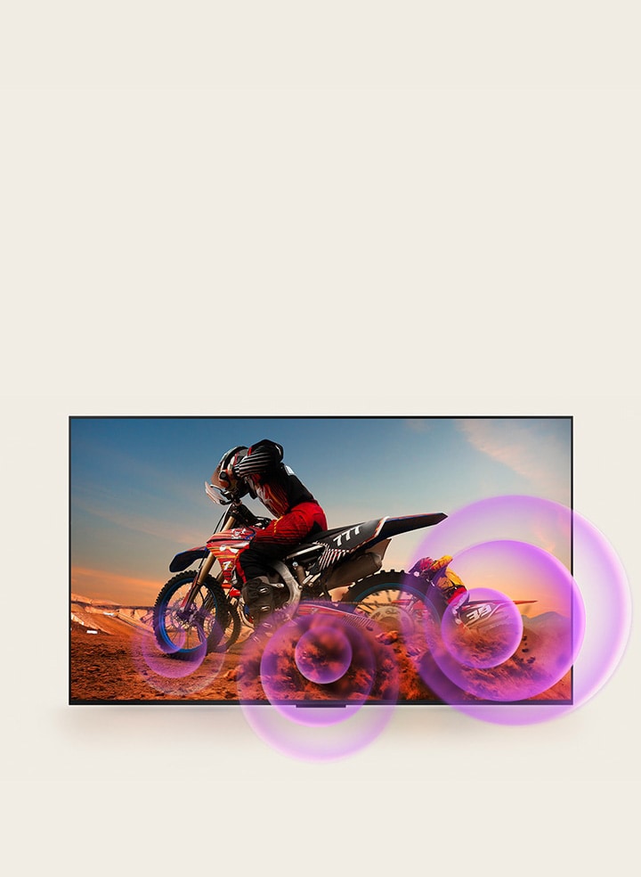 LG QNED TV depicts a man on a motorcycle with purple abstract circles coming out of the wheel to visualize sound emission.