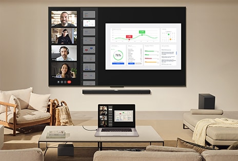 LG TV mounted on a wall above a LG Soundbar. Zero Connect Box placed under a coffee table.