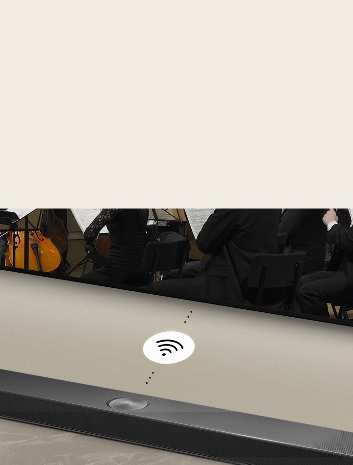 A close up of an LG Soundbar below a LG TV. A connectivity symbol is in between LG Soundbar and a LG TV, showing WOWCAST's wireless operation.