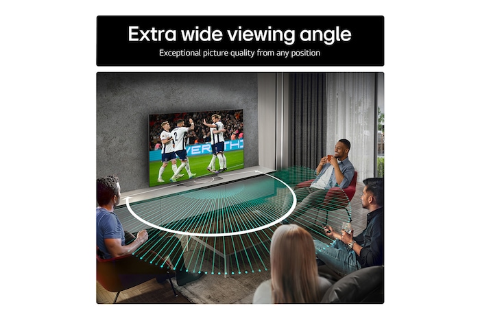 Living room space with a wall-mounted LG OLED TV. On the TV is a mountain range against a dark evening sky filled with stars. This scene is split in half. One side shows a duller, grayer version of the landscape labeled, Non Perfect Black display. On the other side is a more pleasing picture with a larger dynamic range of blacks and whites.