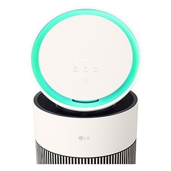 Close-up of LG air purifier's top display with a glowing air quality indicator light.