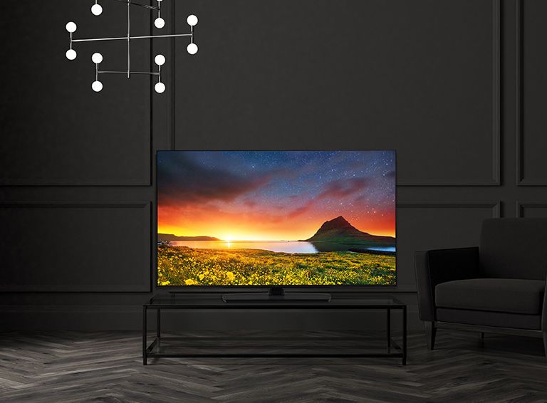 Tv trên bàn khách sạn hiển thị màn hình sống động và sáng sủa.