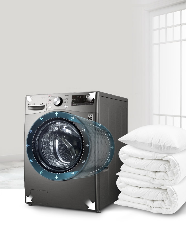 Có một máy giặt trong nhà và một tấm chăn bên cạnh. Phần giữa của máy giặt với động cơ có hiệu ứng trong suốt, thể hiện bên trong máy giặt.