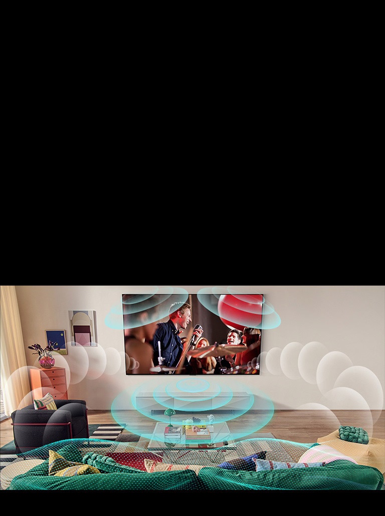 Hình ảnh LG OLED TV trong phòng chiếu buổi hòa nhạc. Bong bóng mô tả âm thanh vòm ảo bao quanh không gian.