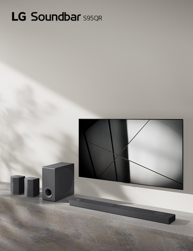 LG sound bar S95QR and LG TV are placed together in the living room. The TV is on, displaying a black and white image.