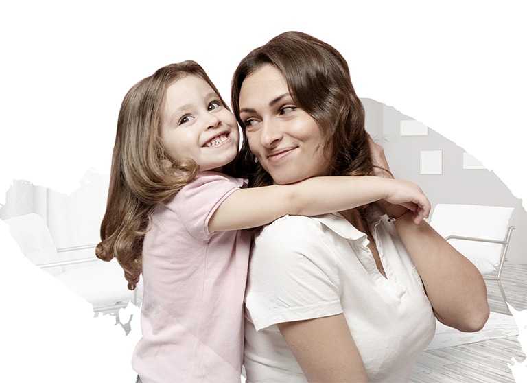 A happy and comfortable mother and daughter.