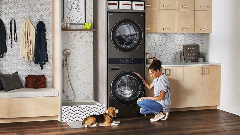 Image of a woman sitting in front of a product.