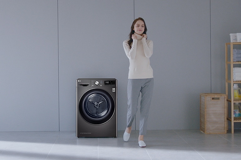 Woman standing near LG dryer