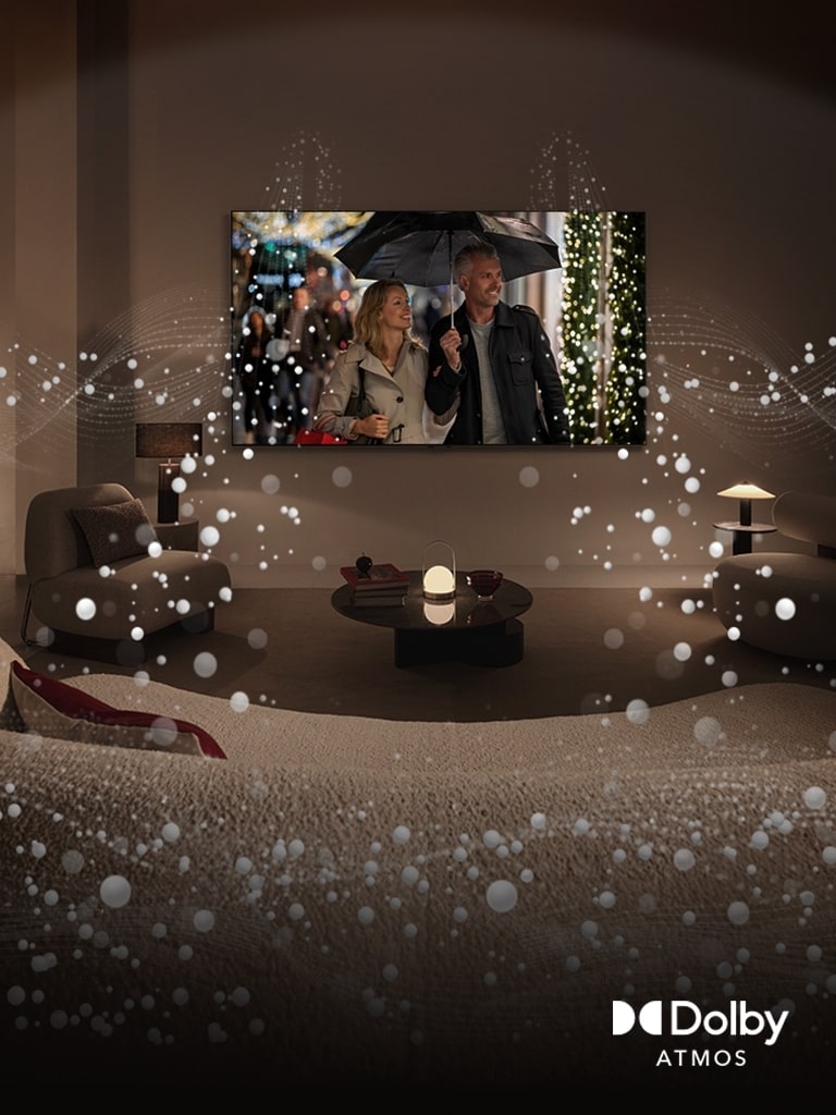 A cozy, dimly lit living space, LG OLED TV displaying a couple is using an umbrella, and bright circle graphics surround the room. Dolby Atoms logo in the bottom left corner.