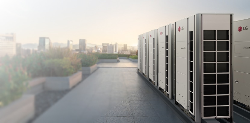 Woman shopping in a clothing store, holding a green embroidered dress while carrying a shopping bag.