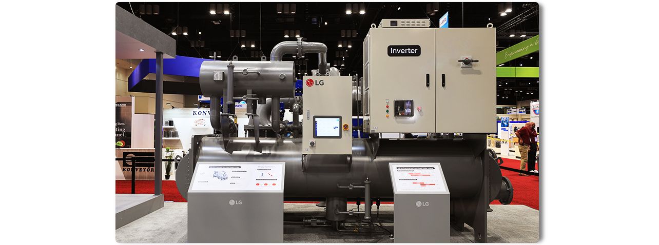 LG's chiller system with inverter unit displayed at trade show, featuring advanced HVAC technology and control panels.