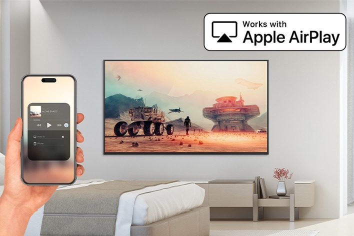 The image demonstrates that the AirPlay feature allows content from an iPhone to be displayed on the in-room hotel TV.