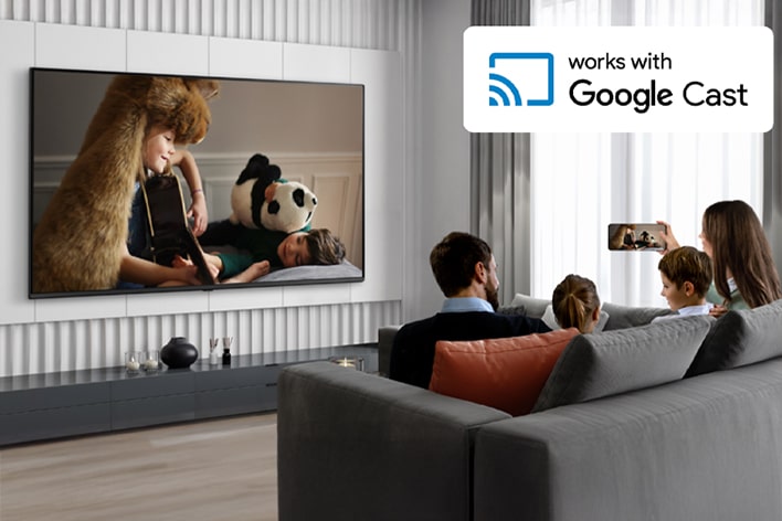 This image shows hotel guests streaming content from their smartphone to the in-room hotel TV.