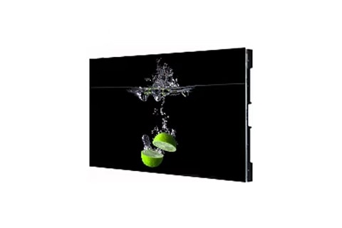 A digital display showing a vivid image of green lime halves splashing into water against a black background.