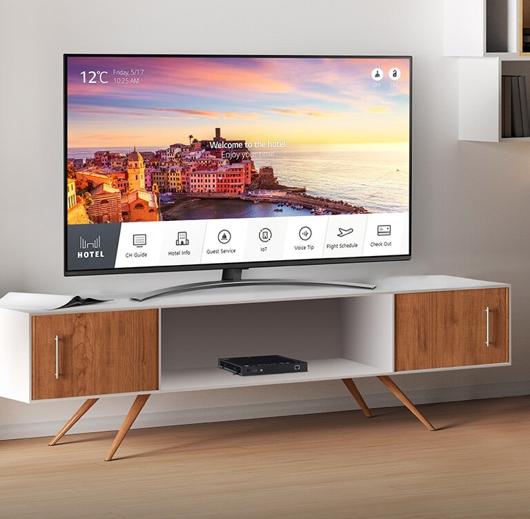 There is a simulated image to show Pro:Centric Set Top Box, STB-6500, installed in the hotel room. The TV connected to STB-6500 provides various information and services to guests.