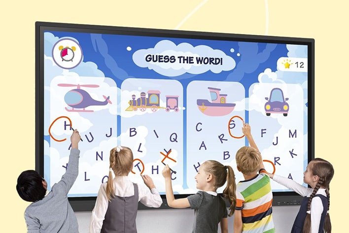 Four children are seen learning with an LG display product.