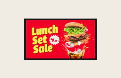 Digital menu board displaying a burger meal with chips and a drink, labelled "Lunch Set".