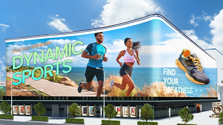 LG large-format LED signage in building lobby displaying vivid underwater scene with school of fish. LG digital display solutions delivering immersive visuals for corporate and commercial spaces