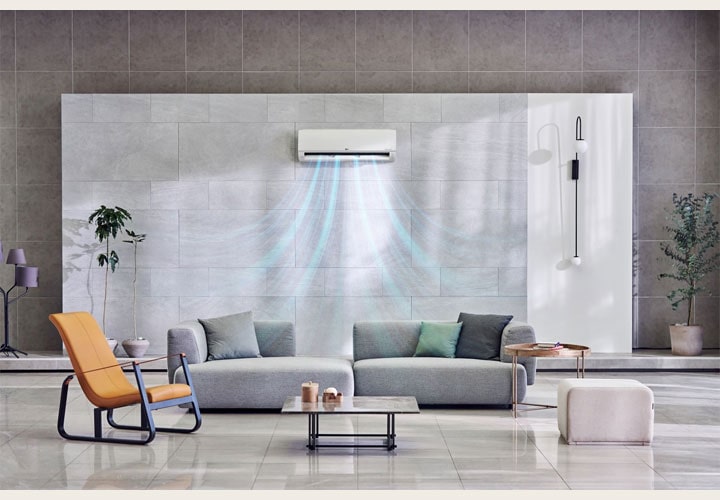 Sala moderna com ar-condicionado LG montado na parede, distribuindo fluxo de ar fresco em um ambiente elegante e minimalista.