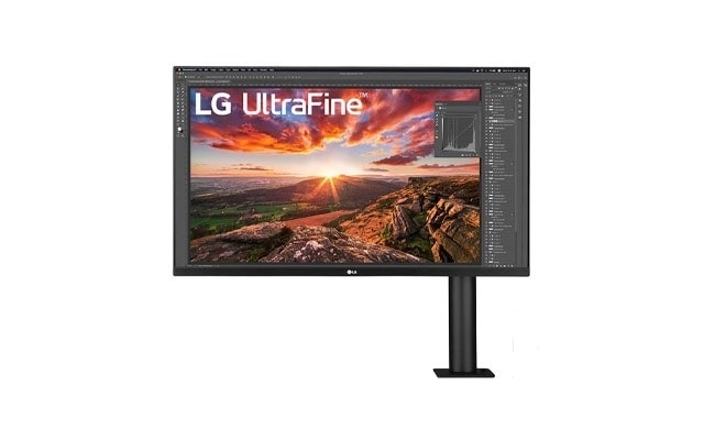 A sunset landscape image is displayed on a LG UltraFine Ergo Monitor with a G energy rating