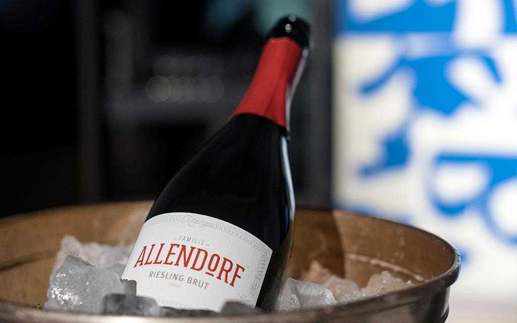 A bottle of Allendorf wine sits chilling during a wine tasting at LG SIGNATURE ARTWEEK