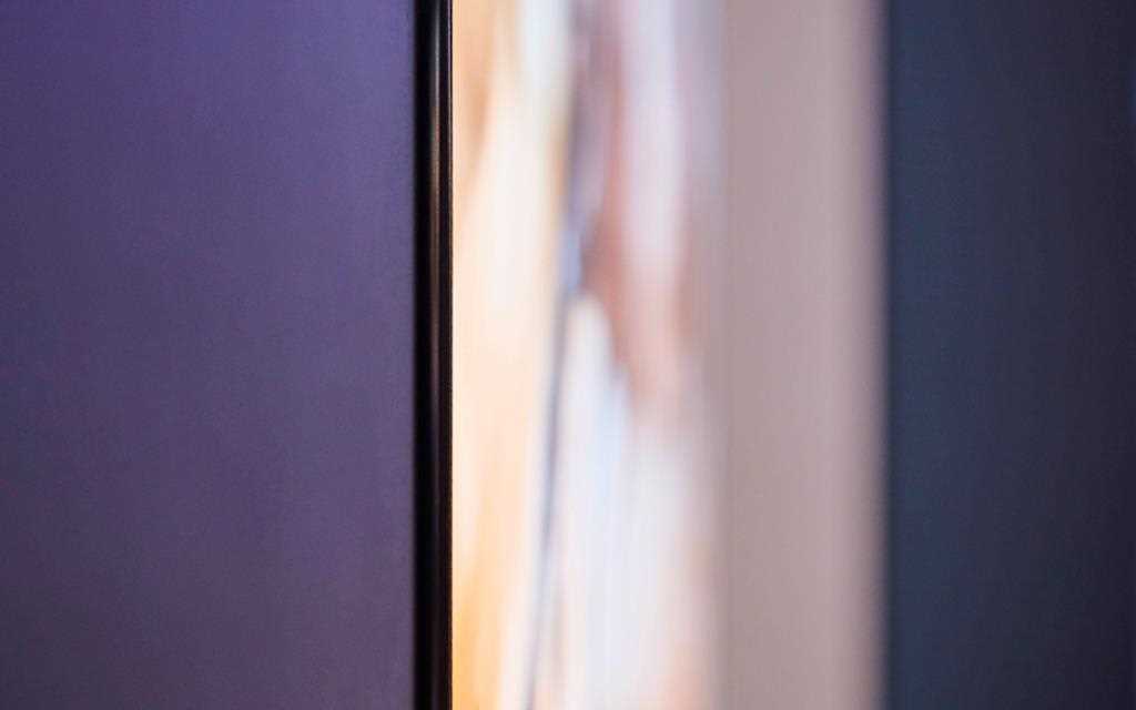 A close-up image of the LG 8K OLED TV, which is almost as thin as a credit card | More at LG Magazine