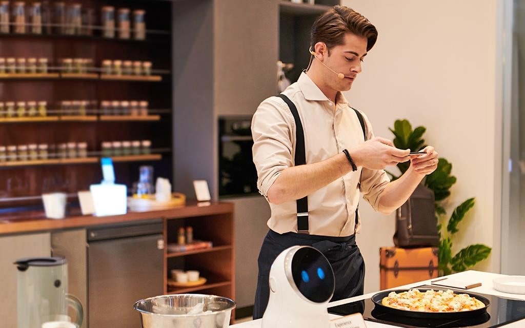 IFA 2018: A demonstrator cooks a meal in a kitchen fitted out with LG ThinQ products including CLOi, in the gourmet zone