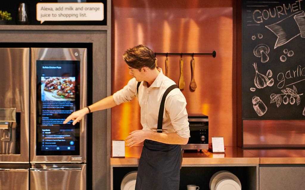 IFA 2018: A demonstrator points at the LG InstaView ThinQ refrigerator in the gourmet zone