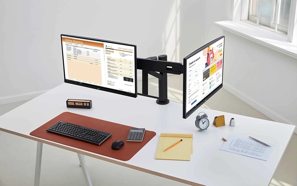 Adjustable dual monitors save space with a C-clamp stand