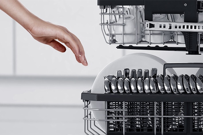 Side view of shelves inside of LG SIGNATURE Dishwasher that shows how it's well designed with glide rail and ball bearing wheel.