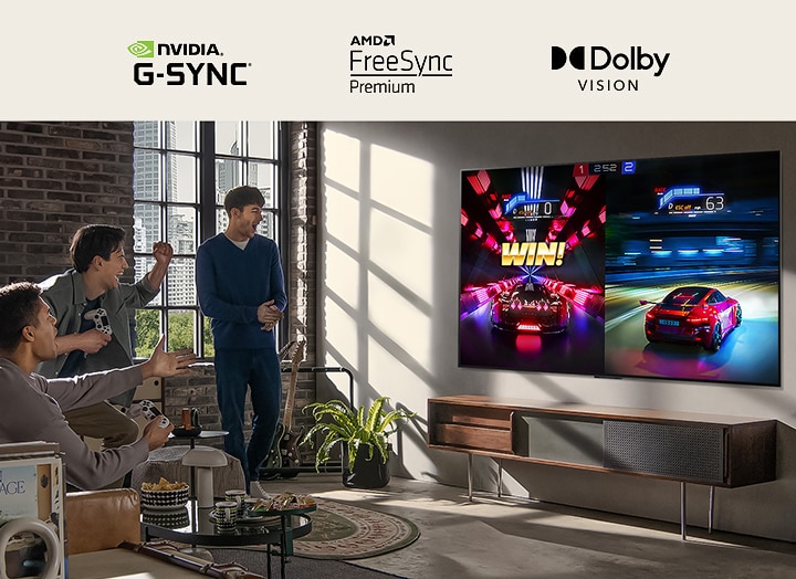 An image of people playing a game on an LG OLED TV in a modern city apartment.