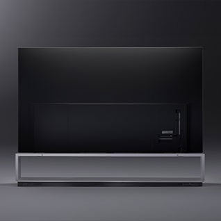 Image of the LG SIGNATURE OLED 8K taken from behind. The image shows the back of the TV, including the base and connectivity ports, against a dark backdrop.