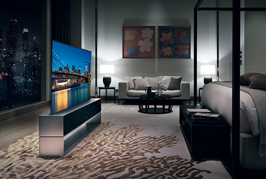 Luxurious living room with the LG SIGNATURE Rollable OLED TV.