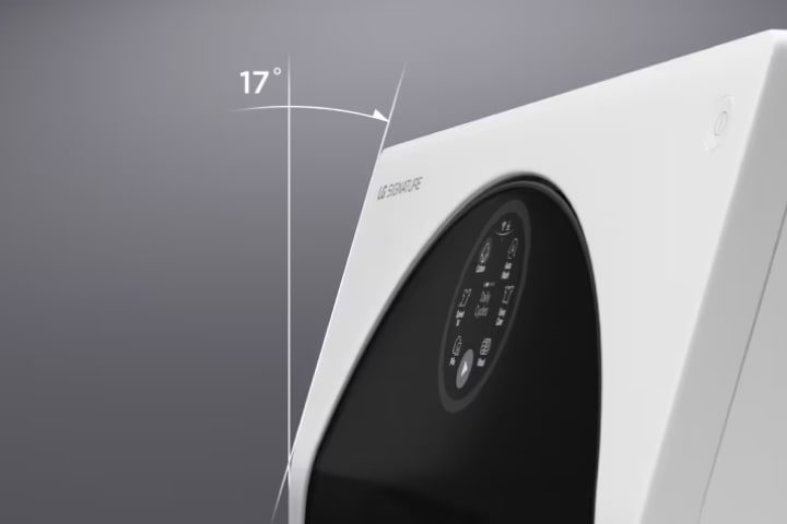 Image of the LG Signature Washing Machine taken from the side to show the unique, slanted design of the top portion of the washing machine.